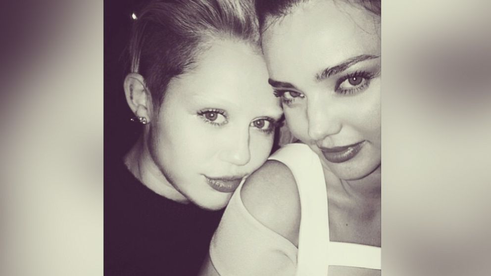 Miranda Kerr posted this photo on Instagram  with this caption, "Shot by the master @mertalas with the gorgeous @mileycyrus", Nov. 20, 2013.