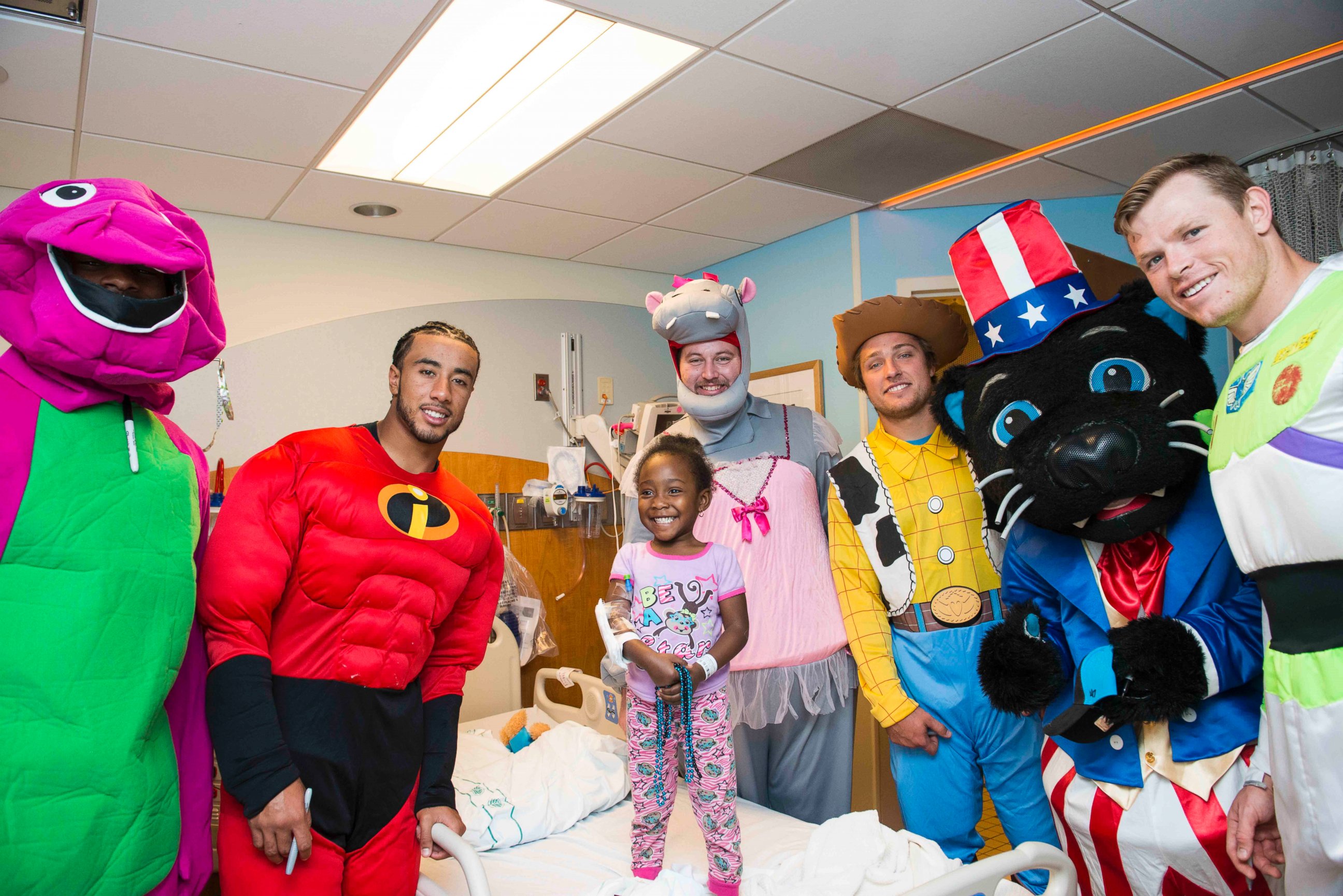 PHOTO: The Carolina Panthers' rookie class traded their football uniforms for Halloween costumes to visit families at a local children's hospital.