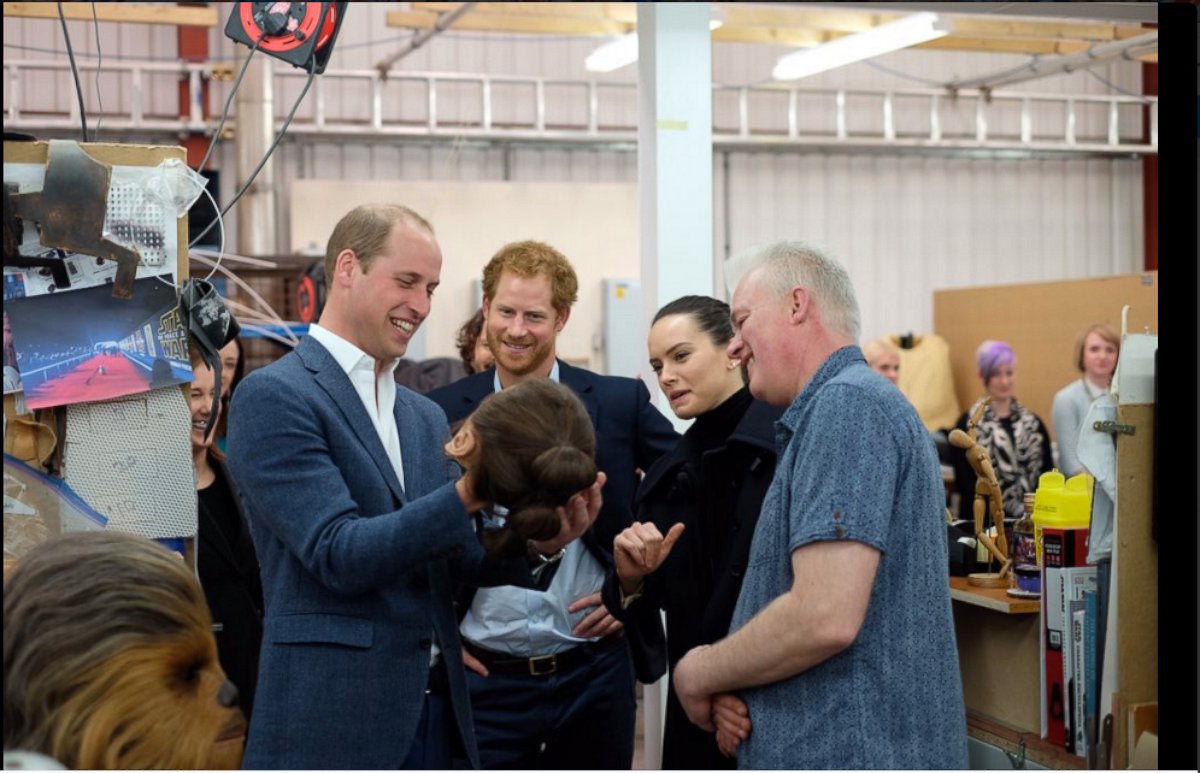 PHOTO:Prince William, Duke of Cambridge, and Prince Harry visit the "Star Wars" costume department with Daisy Ridley at Pinewood Studios in Iver, Buckinghamshire, April 19, 2016.  