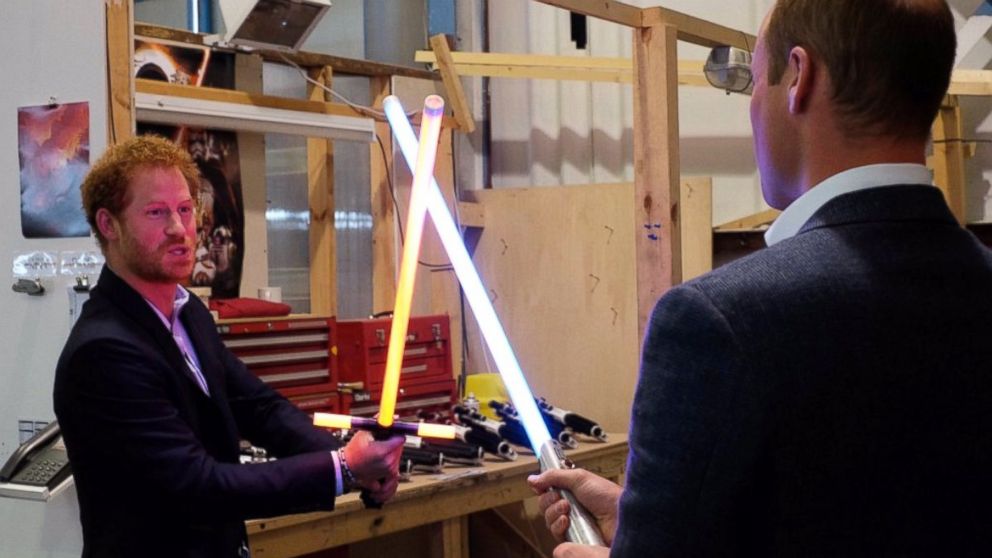 Dueling Royals: Princes William and Harry Spar with Lightsabers