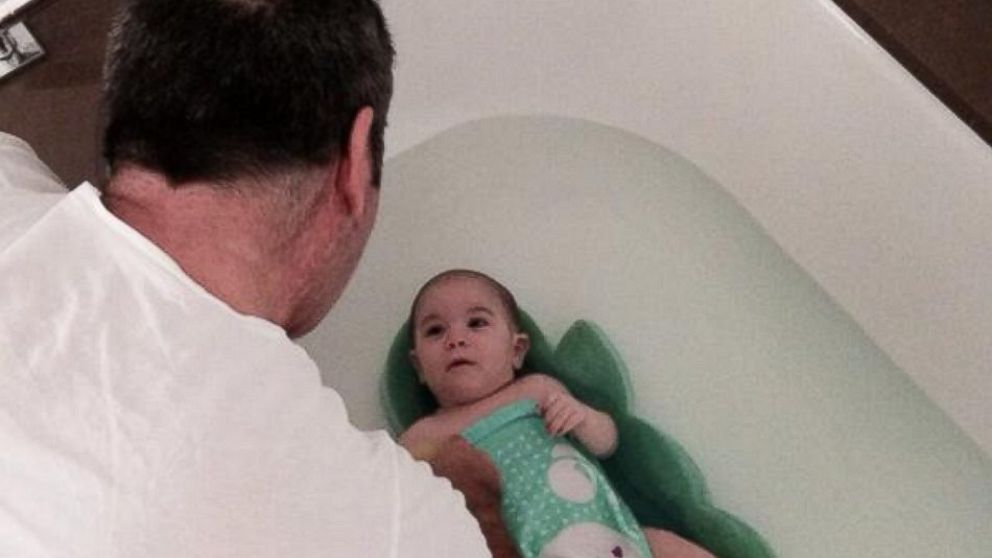 Simon Cowell posted this photo on Twitter on June 19, 2014, with the caption "Bath Time!"