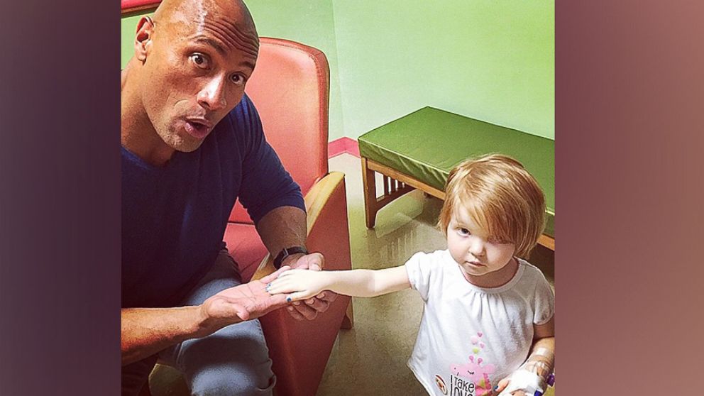 The Rock posted this photo on Instagram while visiting the Children's National Hospital, Dec. 30, 2014.
