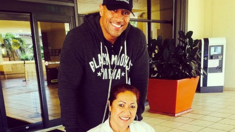 Dwayne Johnson posted this photo to Instagram Aug.12, 2014, with the caption, &ldquo;Takin' mama home. Banged up, but she's a tough one and will make a full recovery. Grateful to see her smile. And thank you guys for all the prayers, love and well wishes. #GratitudeAndBearHugs #ChoicesMatter #100PercentPreventable #DontDrinkAndDrive