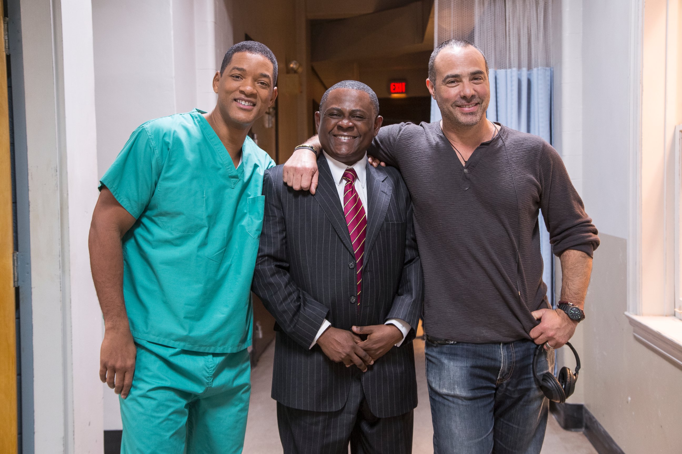 PHOTO: Will Smith, the real Bennet Omalu, and director Peter Landesman on the set of Columbia Pictures' "Concussion."