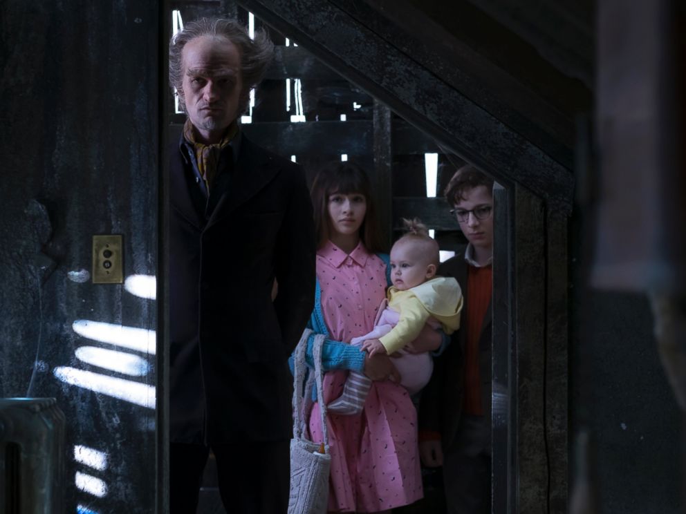 PHOTO: Neil Patrick Harris is pictured here in a still from the Netflix series A Series of Unfortunate Events as Count Olaf with co-stars Malina Weissman and Louis Hynes.