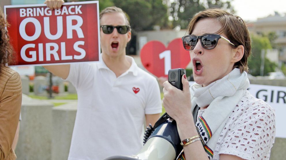 Anne Hathaway and husband Adam Schulman join a 'Bring Back Our Girls' rally in Los Angeles, May 8, 2014.