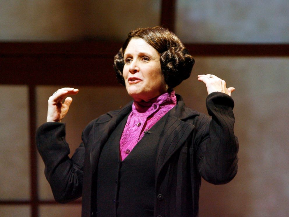 PHOTO: Carrie Fisher explaining the utter horror of her Princess Leia hairstyle in "Wishful Drinking," her solo show at Berkeley Repertory Theatre's Roda Theater, Feb. 7, 2008, in Berkeley, California.