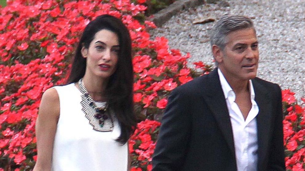 Actor George Clooney and fiancée Amal Alamudin step out for dinner in Italy, June 23, 2014.