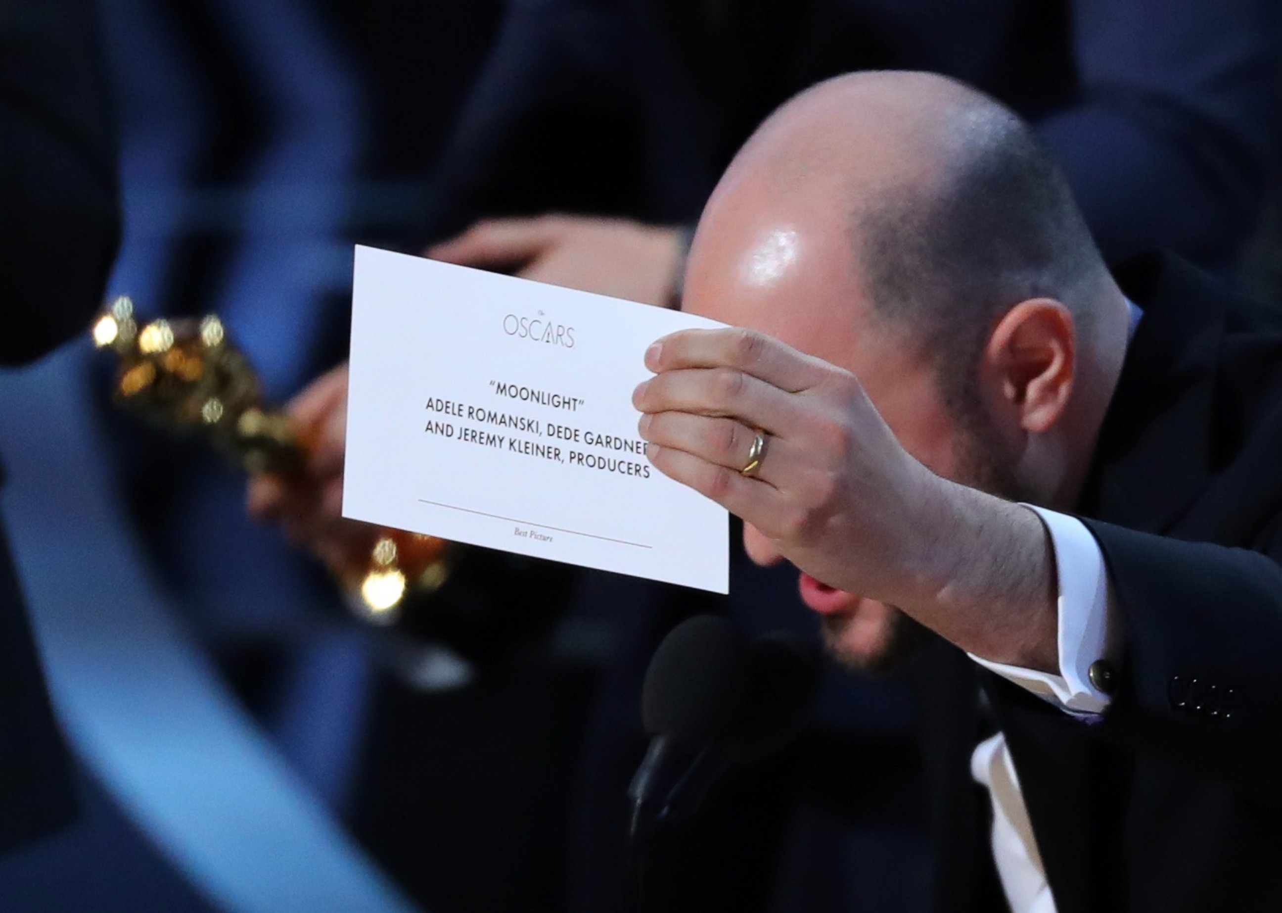 PHOTO: Producer Jordan Horowitz holds up the card for the Best Picture winner, "Moonlight."
