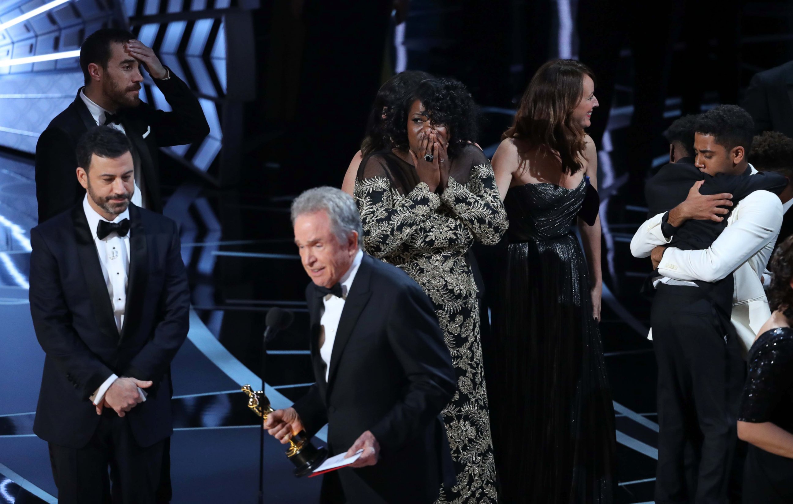 PHOTO: Members of the casts and crew from "Moonlight" react as presenter Warren Beatty announces that "Moonlight" won the Best Picture award at the 89th Academy Awards, Feb. 26, 2017.
