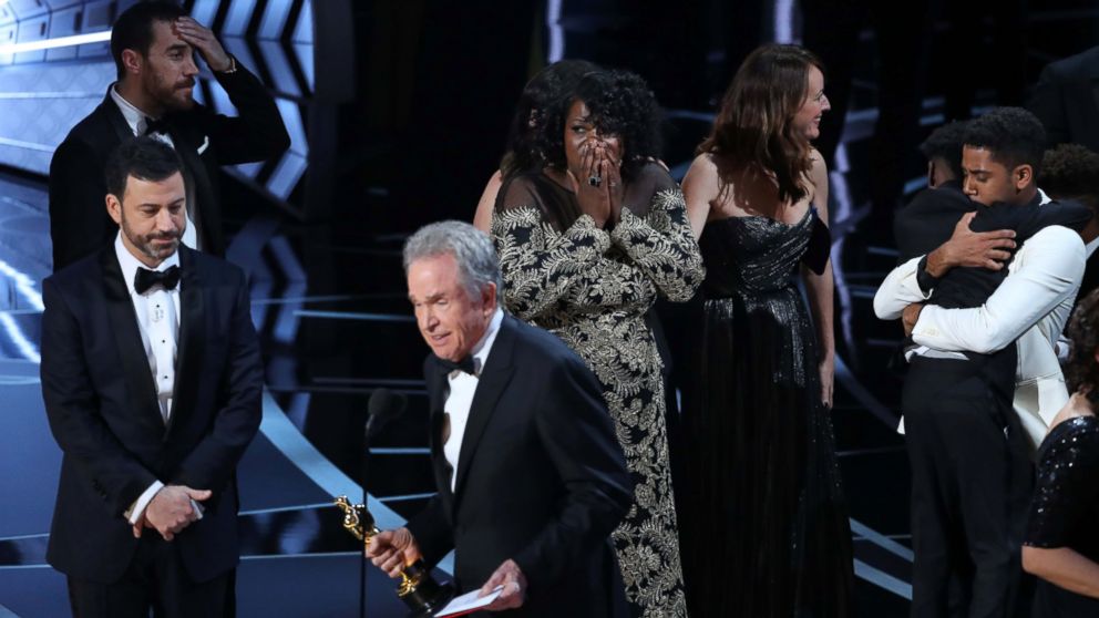 PHOTO: Members of the casts and crew from "Moonlight" react as presenter Warren Beatty announces that "Moonlight" won the Best Picture award at the 89th Academy Awards, Feb. 26, 2017.