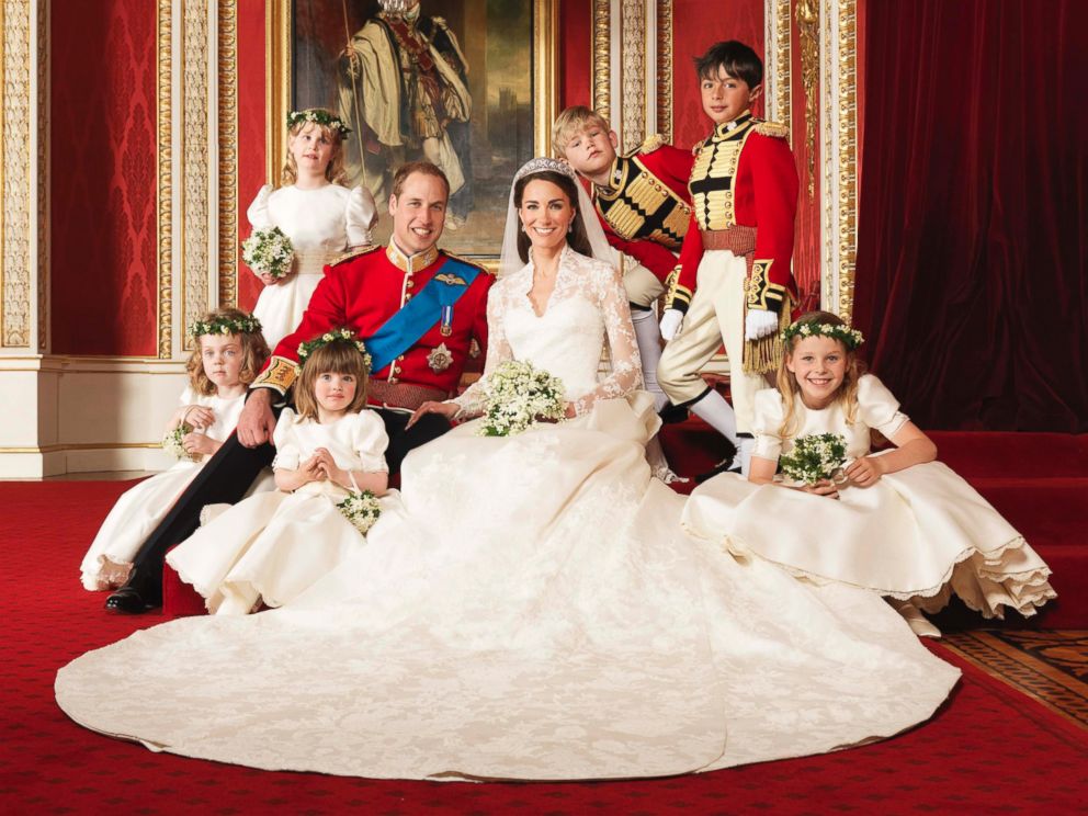 PHOTO: Britains Prince William and his bride Catherine, Duchess of Cambridge, pose for an official photograph, with their bridesmaids and pageboys, on the day of their wedding, in the throne room at Buckingham Palace, in central London, April 29, 2011.