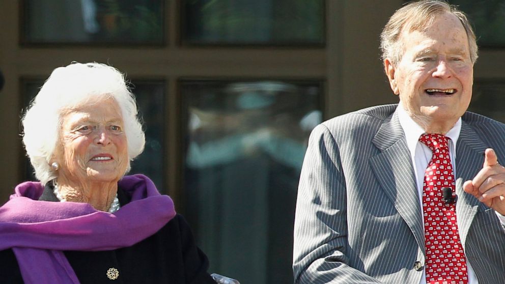 Former first lady Barbara Bush, left and former U.S. President George H.W. Bush  sit onstage at the dedication of the George W. Bush Presidential Center on the campus of Southern Methodist University in Dallas, April 25, 2013. 