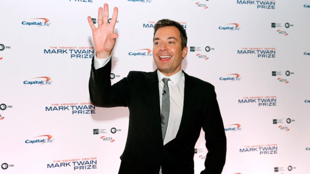 Jimmy Fallon arrives on the red carpet for the taping of the Mark Twain Prize for Humor ceremony and performance, honoring comedian Jay Leno, at the Kennedy Center in Washington on Oct. 19, 2014. 