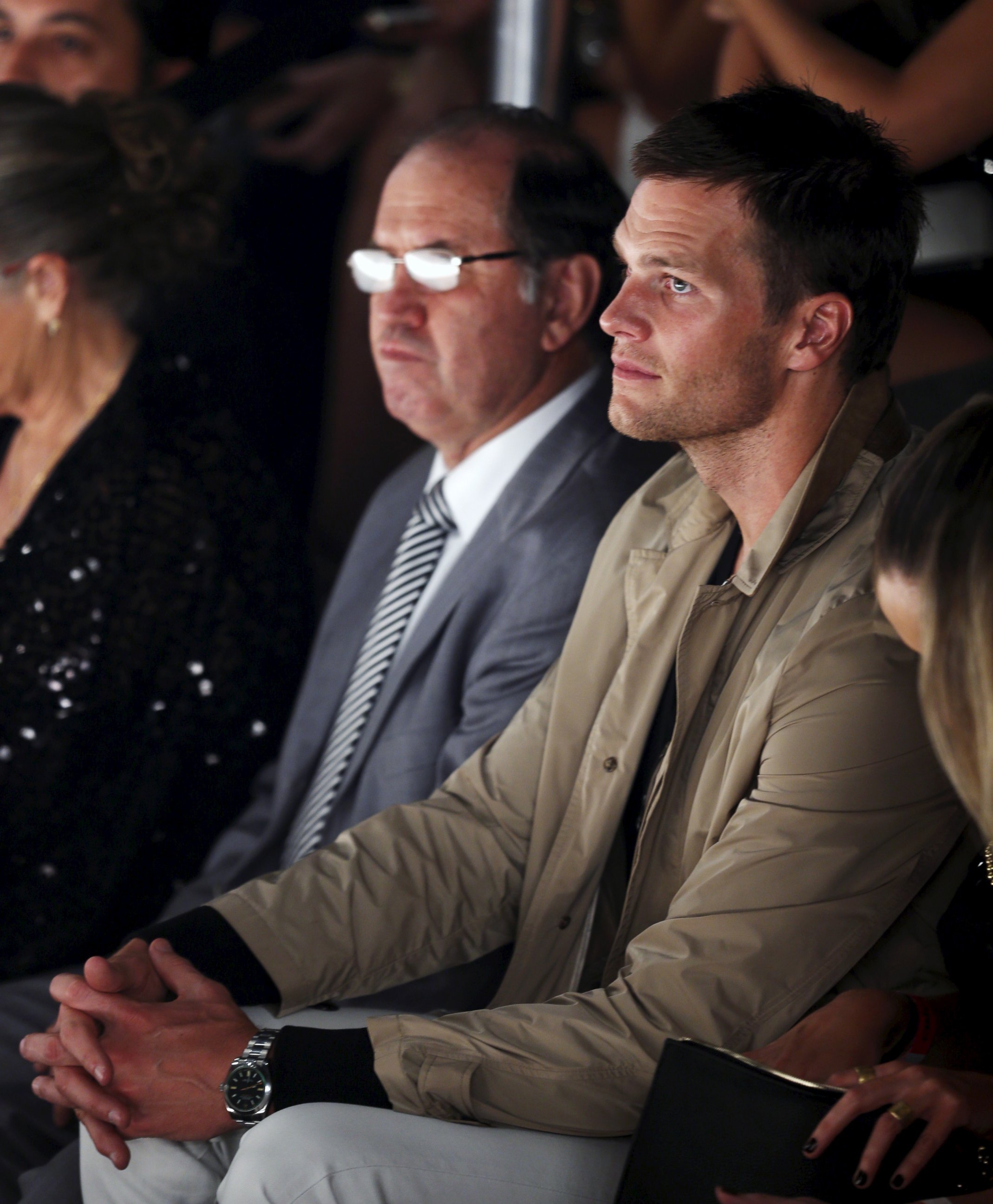 PHOTO: NFL player Tom Brady watches his wife model Gisele Bundchen as she presents creations for the Colcci Summer 2016 collection during Sao Paulo Fashion Week in Sao Paulo April 15, 2015.