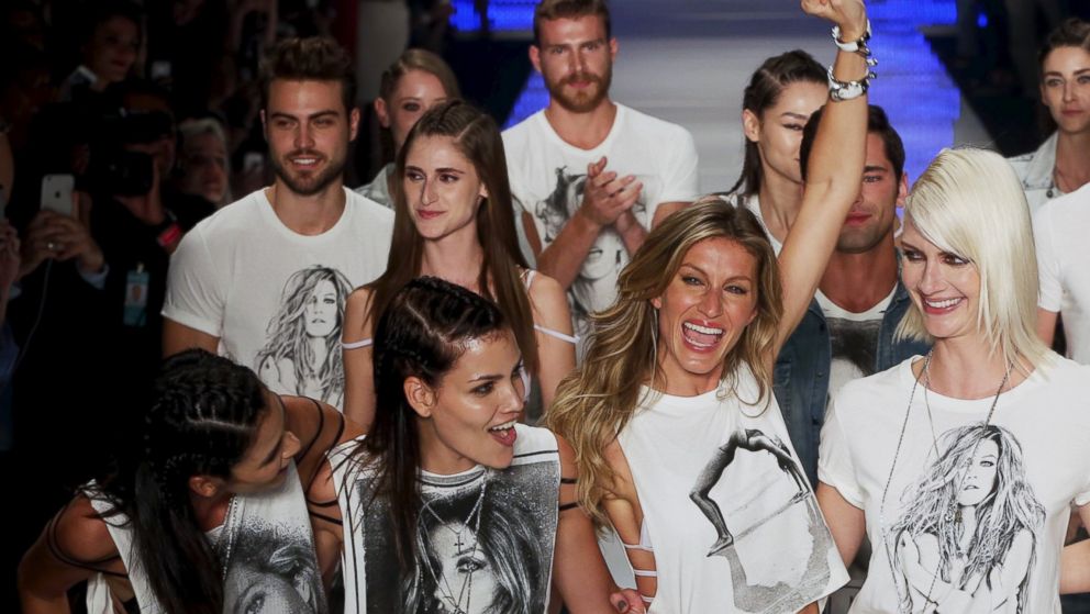 PHOTO: Model Gisele Bundchen reacts as she and other models present creations from the Colcci Summer 2016 collection during Sao Paulo Fashion Week in Sao Paulo, Brazil, April 15, 2015.