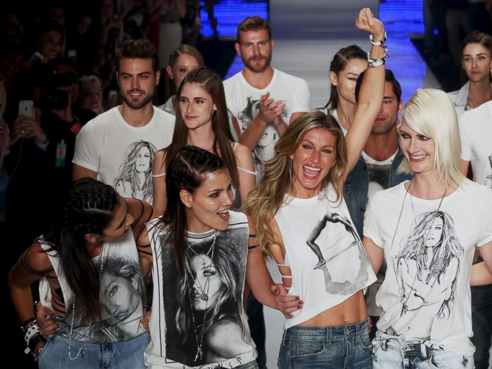 PHOTO: Model Gisele Bundchen reacts as she and other models present creations from the Colcci Summer 2016 collection during Sao Paulo Fashion Week in Sao Paulo, Brazil, April 15, 2015.