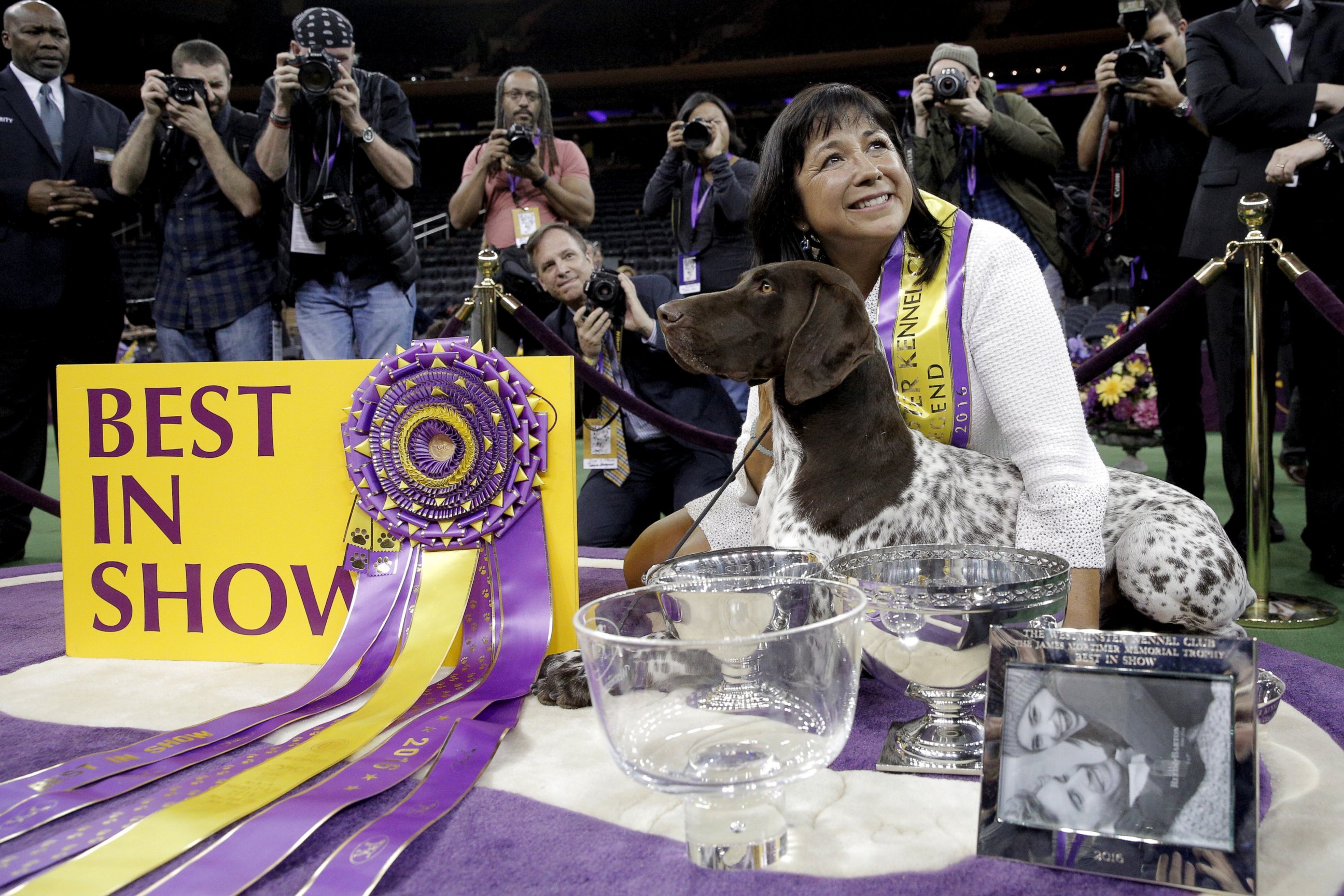 PHOTO: Handler Valerie Nunez Atkinson poses with CJ, a German Shorthaired Pointer from the Sporting Group, after they won Best in Show at the Westminster Kennel Club Dog show at Madison Square Garden in New York, Feb. 16, 2016. 