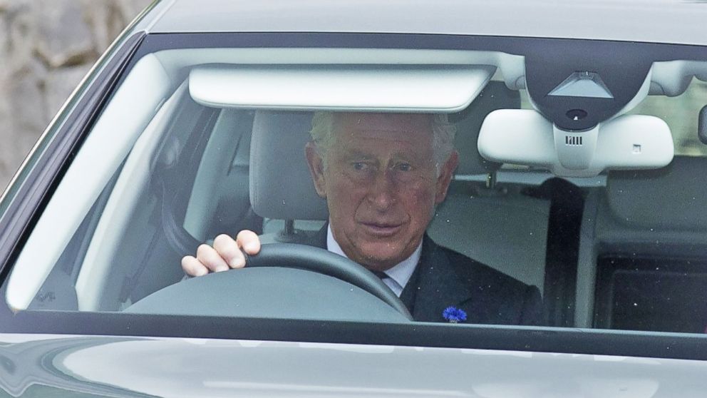 Prince Charles is seen driving with Camilla Duchess of Cornwall on a visit to Crathie Church, Balmoral, Scotland, Sept. 11, 2016.