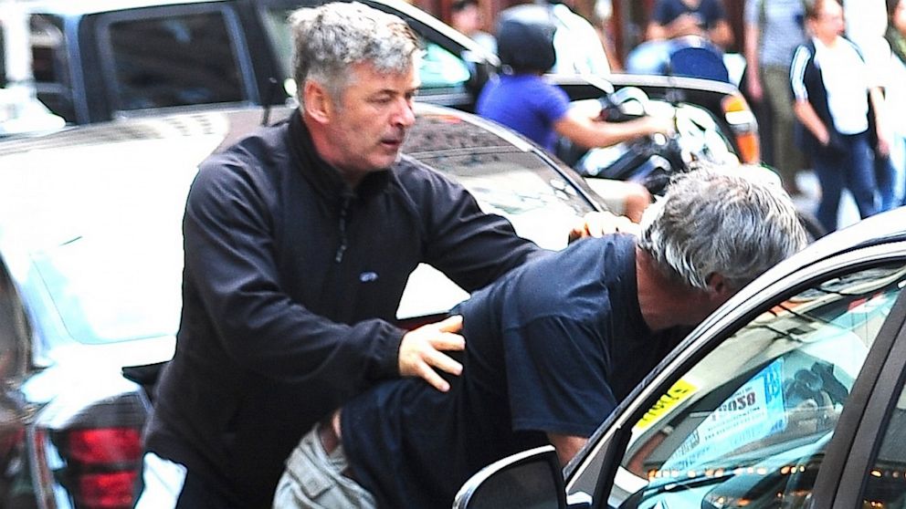Alec Baldwin fights with a photographer over his wife in New York City, Aug. 27, 2013. 
