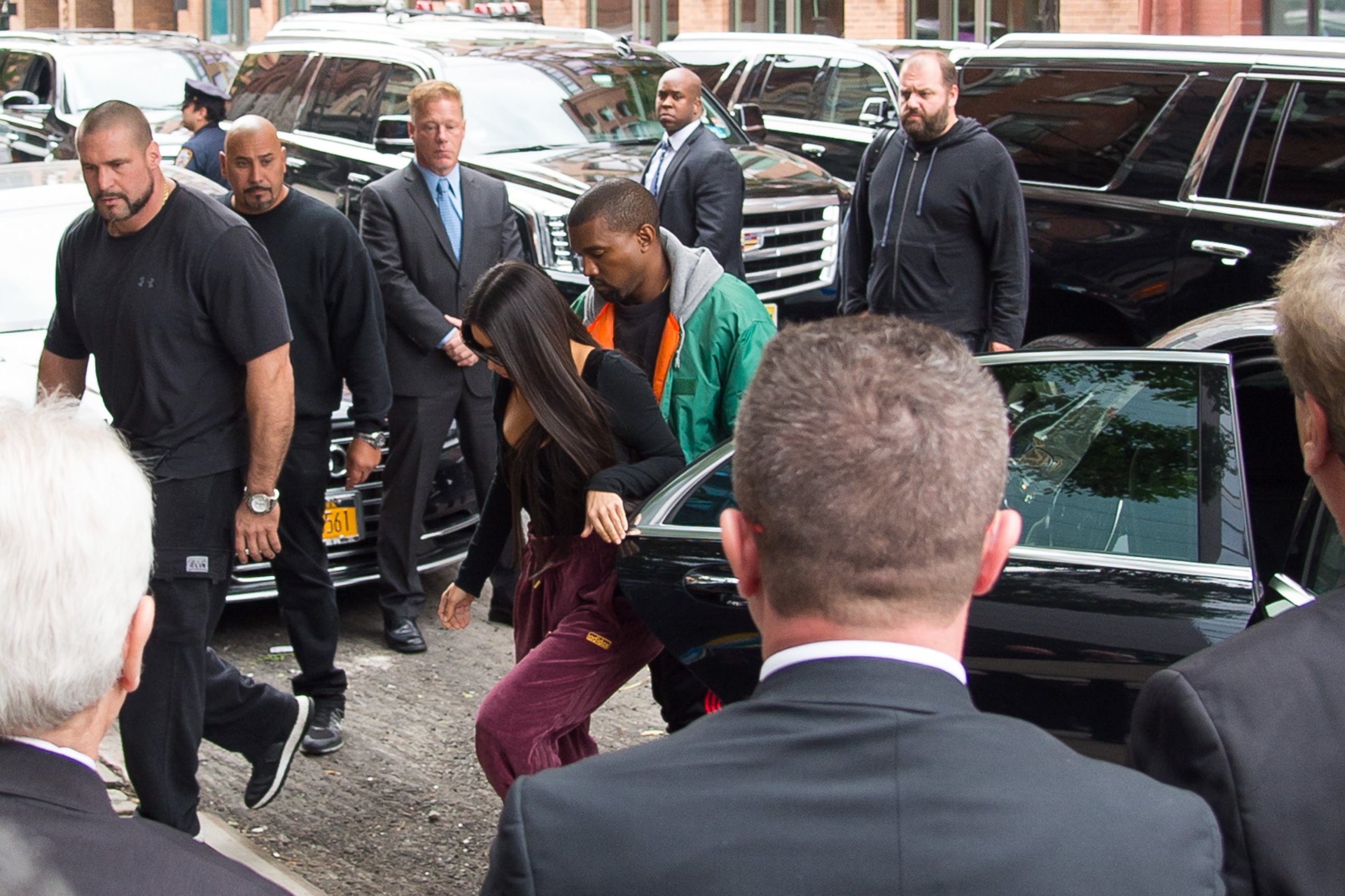 PHOTO: Kim Kardashian and Kanye West are seen at their home in the Tribeca neighborhood in New York the day after Kim was robbed at gunpoint in Paris, Oct. 3, 2016. 