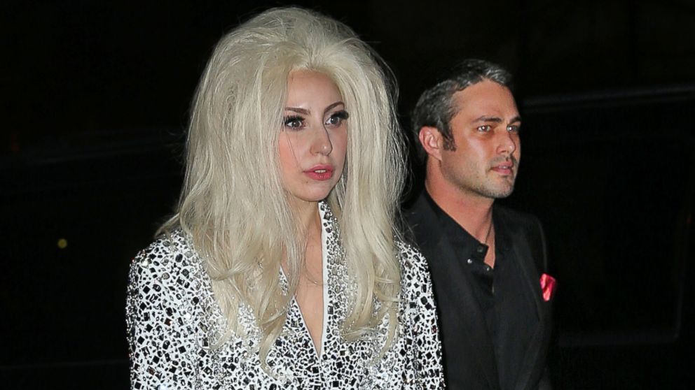 Lady Gaga, left, and Taylor Kinney, right, are pictured on Dec. 22, 2013 in New York City. 