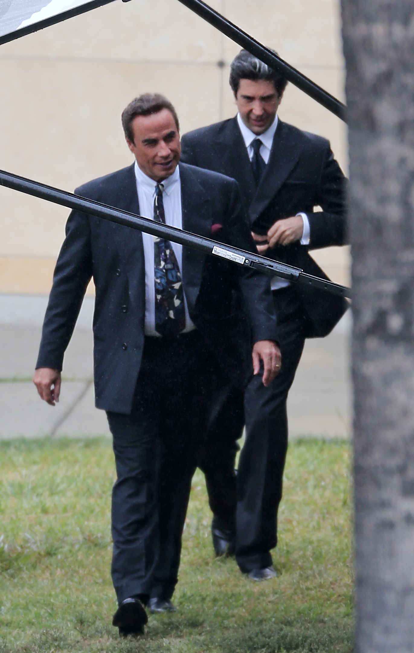 PHOTO: John Travolta and David Schwimmer film "American Crime Story" together in Los Angeles, May 14, 2015.
