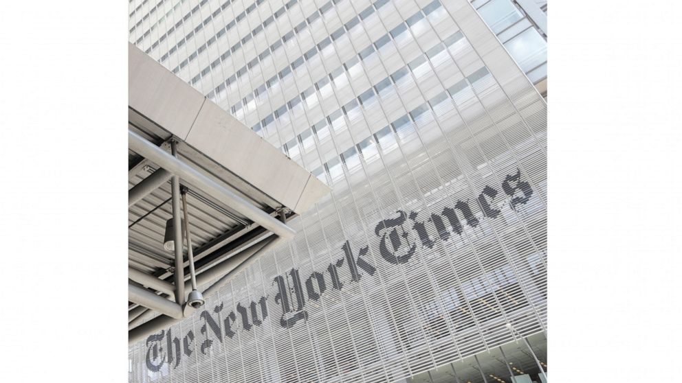 FILE - This June 22, 2019 file photo shows the exterior of the New York Times building in New York. News organizations across the United States are lifting paywalls to share coverage of the coronavirus pandemic, a public service many hope will convin
