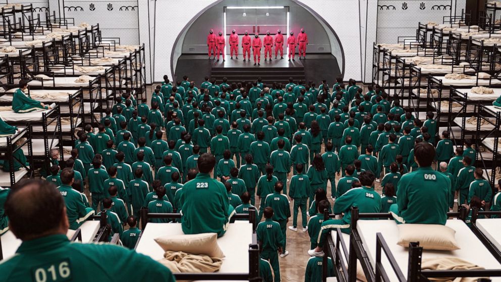 This image released by Netflix shows a scene from the popular Korean series "Squid Game." Netflix announced "Squid Game: The Challenge," a reality competition show, based on the series. (Netflix via AP)