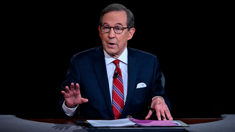 FILE - Moderator Chris Wallace of Fox News speaks as President Donald Trump and Democratic presidential candidate former Vice President Joe Biden participate in the first presidential debate in Cleveland on Sept. 29, 2020. Wallace will host a Sunday 