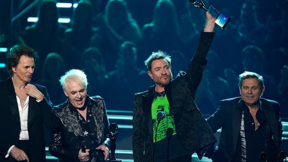 Inductees John Taylor, from left, Nick Rhodes, Simon Le Bon, and Roger Taylor of Duran Duran speak during the Rock & Roll Hall of Fame Induction Ceremony on Saturday, Nov. 5, 2022, at the Microsoft Theater in Los Angeles. (AP Photo/Chris Pizzello)