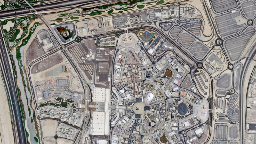 In this Aug. 8, 2021 satellite photo taken by Planet Labs Inc., the site of Expo 2020 is seen in Dubai, United Arab Emirates. Delayed a year over the coronavirus pandemic, Dubai's Expo 2020 opens this Friday. It will put this city-state all-in on its