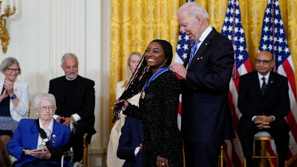 Biden awards Medal of Independence to Biles, McCain, Giffords