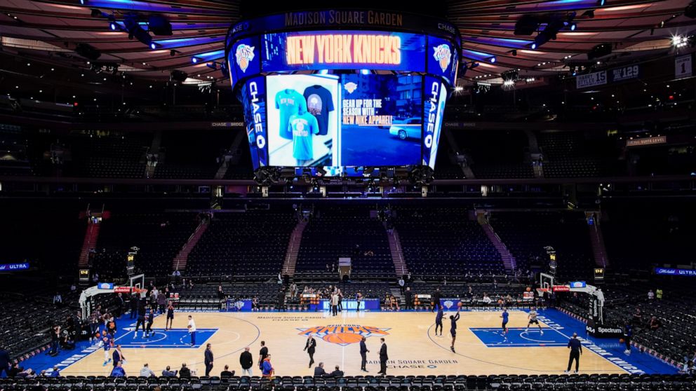 New York Knicks players and Indiana Pacers players warm up before a preseason NBA basketball game, Friday, Oct. 7, 2022, in New York. (AP Photo/Eduardo Munoz Alvarez)