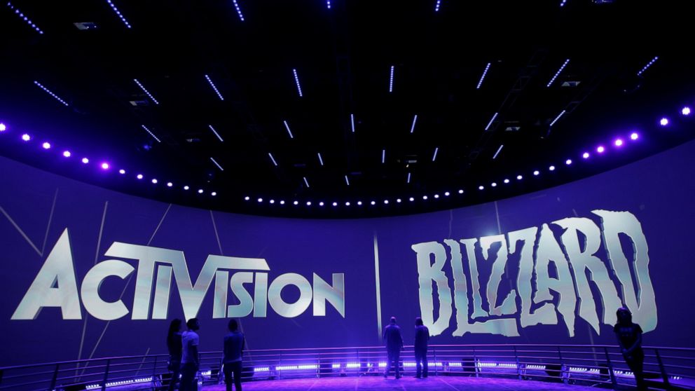 FILE - The Activision Blizzard Booth is shown on June 13, 2013, during the Electronic Entertainment Expo in Los Angeles. Microsoft’s purchase of video game publisher Activision Blizzard faces antitrust scrutiny in the U.K., where competition regulato