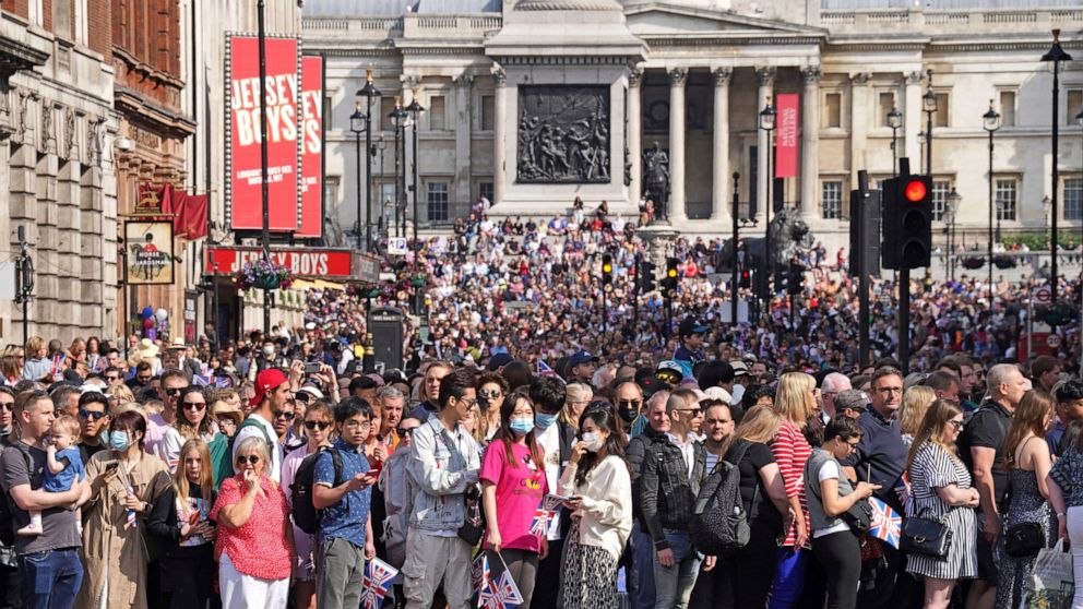 Crowds gather near Trafalgar Square in London, Thursday June 2, 2022, on the first of four days of celebrations to mark the Platinum Jubilee. The events over a long holiday weekend in the U.K. are meant to celebrate the monarch’s 70 years of service.