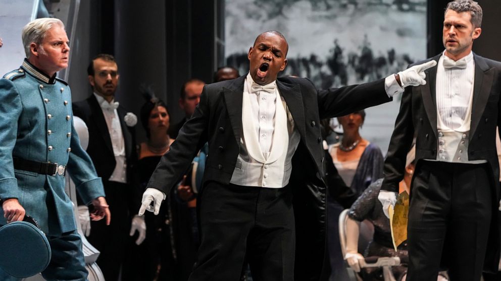 This image released by Opera Philadelphia shows, from left, tenor Toffer Mihalka, tenor Lawrence Brownlee and bass-baritone Christian Pursell during a performance of "Otello." (Steven Pisano/Opera Philadelphia via AP)