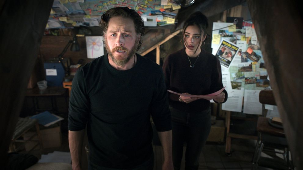 This image released by Netflix shows Josh Dallas, left, and Luna Blaise in a scene from" Manifest." Season four premieres on Nov. 4. (Netflix via AP)