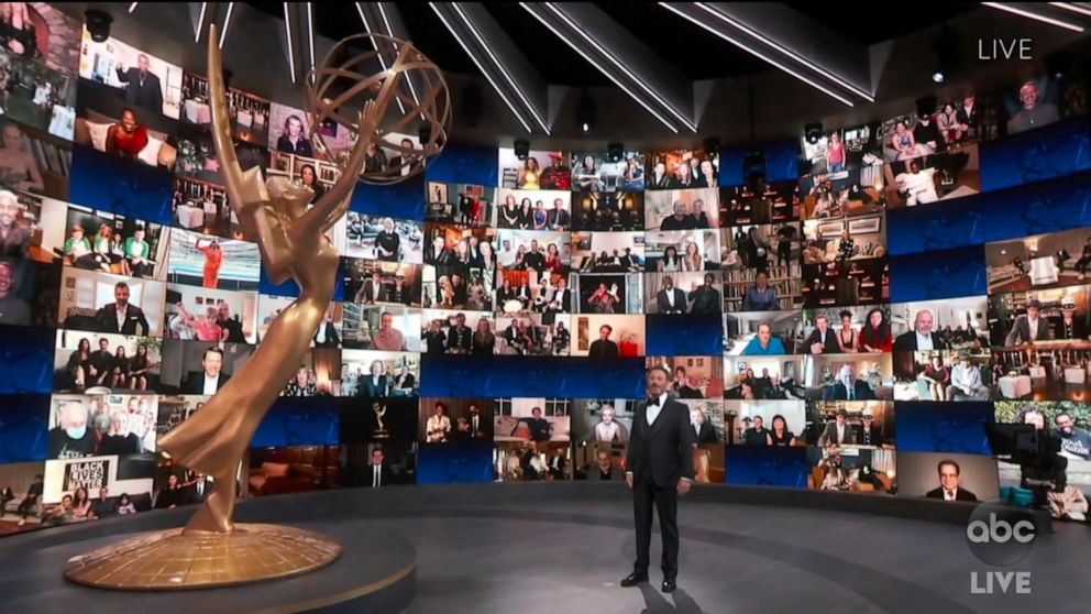 In this video grab captured on Sept. 20, 2020, courtesy of the Academy of Television Arts & Sciences and ABC Entertainment, host Jimmy Kimmel appears with a screen filled with nominees during the 72nd Emmy Awards broadcast. (The Television Academy an
