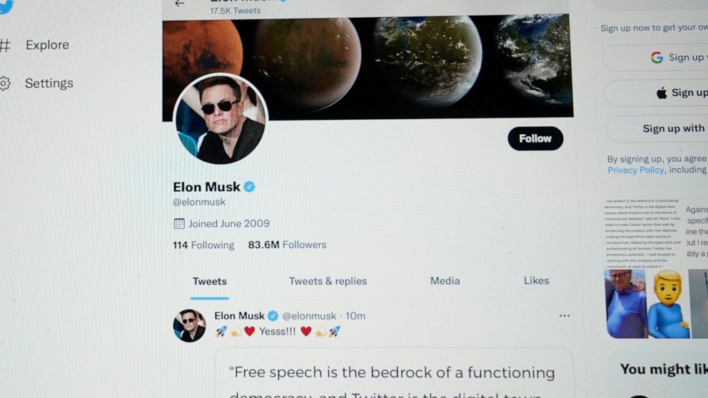 FILE - The Twitter page of Elon Musk is seen on the screen of a computer in Sausalito, Calif., on Monday, April 25, 2022. Elon Musk wants to change how Twitter doles out its checkmark badges for verified accounts. While the “blue check” is at times v