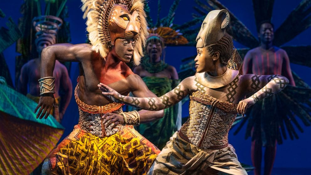 This image released by Disney Theatricals shows Brandon A. McCall as Simba, left, and Pearl Khwezi as Nala during a performance of The Lion King on Broadway in New York on Sept. 14, 2022. The musical turns 25 years old on Broadway this month. (Matthe