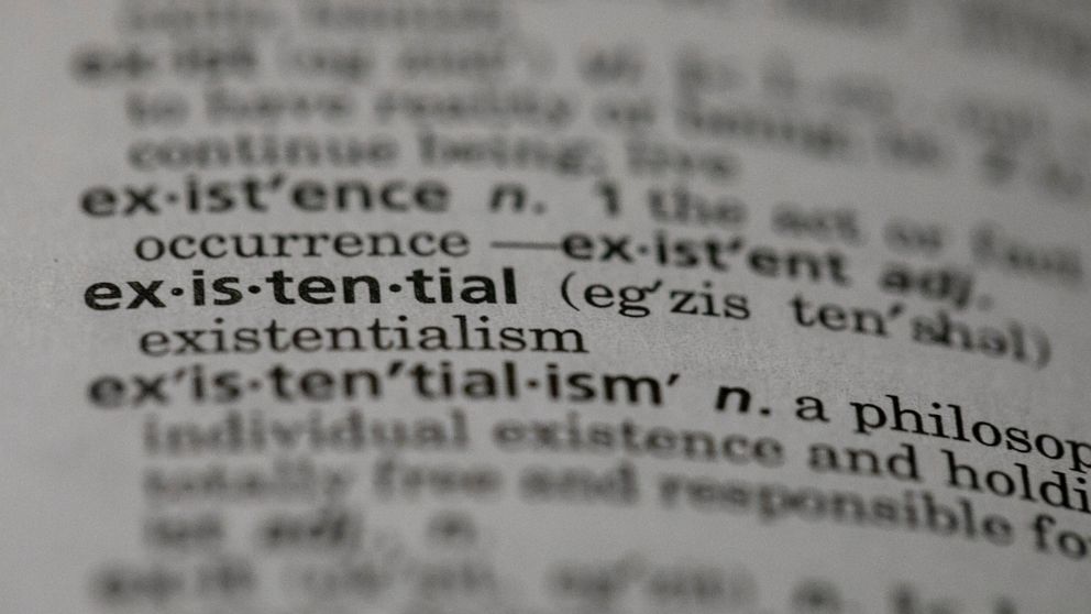 This Sunday, Dec. 1, 2019, photo shows the word "existential" in a dictionary in the Brooklyn borough of New York. Dictionary.com picked “existential” as the word of the year. The choice reflects months of high-stakes threats and crises, real and pon