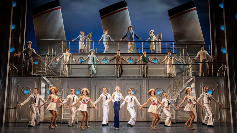 This image released by Matt Ross Public Relations shows Sutton Foster, foreground center, with the cast of the London production of "Anything Goes." A filmed recording of the London cast of Cole Porter’s romp “Anything Goes” hits more than 700 cinema