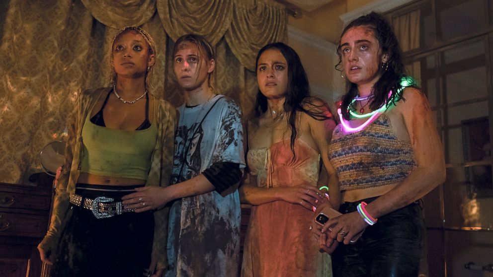This image released by A24 shows, from left, Amandla Stenberg, Maria Bakalova, Chase Sui Wonders and Rachel Sennott in a scene from "Bodies Bodies Bodies." (A24 via AP)
