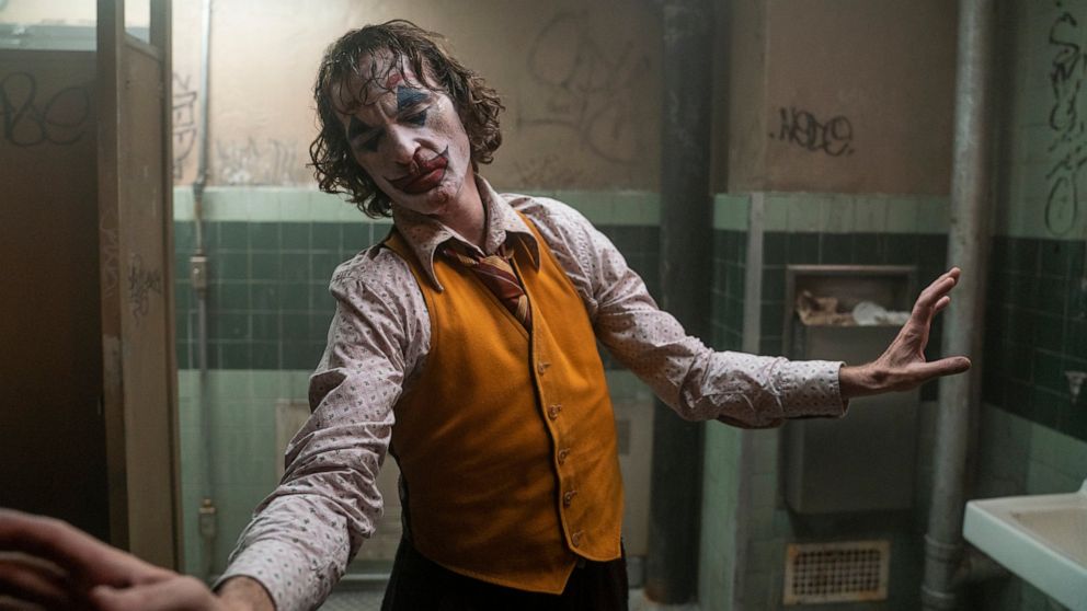 This image released by Warner Bros. Pictures shows Joaquin Phoenix in a scene from "Joker." On Monday, Jan. 13, the film was nominated for an Oscar for best picture. (Niko Tavernise/Warner Bros. Pictures via AP)