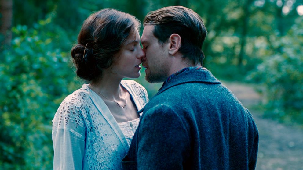 This image released by Netflix shows Emma Corrin, left, and Jack O'Connell in a scene from "Lady Chatterley's Lover." (Netflix via AP)