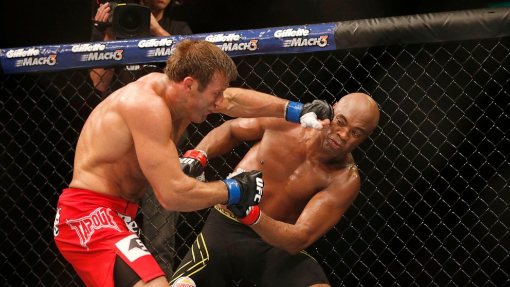 FILE - Anderson Silva, right, of Brazil, fights Stephan Bonnar, of the United States, during their light heavyweight mixed martial arts bout at the Ultimate Fighting Championship (UFC) 153 in Rio de Janeiro, Oct. 14, 2012. UFC says former fighter Bon