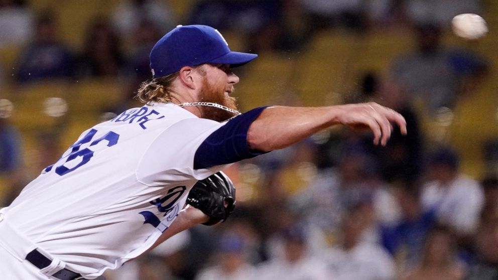 Los Angeles Dodgers relief pitcher Craig Kimbrel throws to the plate during the ninth inning of a baseball game against the San Francisco Giants Tuesday, Sept. 6, 2022, in Los Angeles. (AP Photo/Mark J. Terrill)