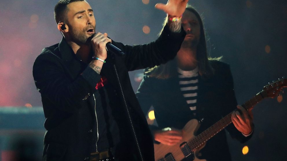 FILE -Adam Levine of Maroon 5 performs during halftime of the NFL Super Bowl 53 football game between the Los Angeles Rams and the New England Patriots Sunday, Feb. 3, 2019, in Atlanta. Maroon 5 and Usher will headline a benefit concert in Atlanta to