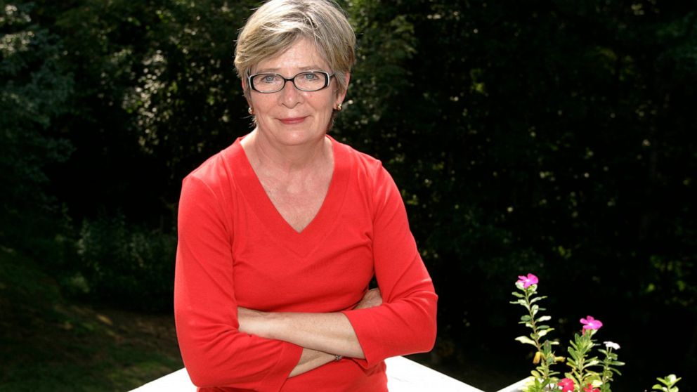 FILE - Author Barbara Ehrenreich poses at her home in Charlottesville, Va., on Aug. 25, 2005. Ehrenreich, the muckraking author, activist and journalist who in such notable works as “Nickel and Dimed” and “Bait and Switch" challenged conventional thi